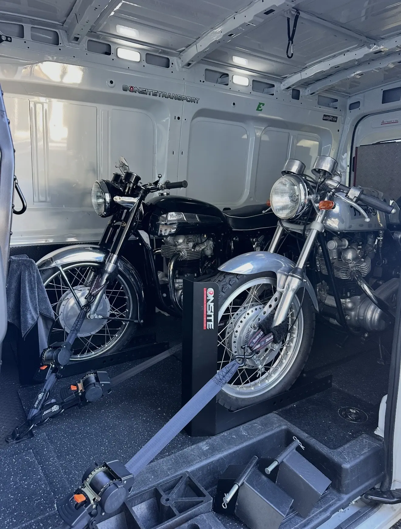 Classic motorcycles secured together for enclosed transport
